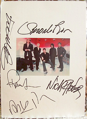 25th Anniversary Tour book fully signed